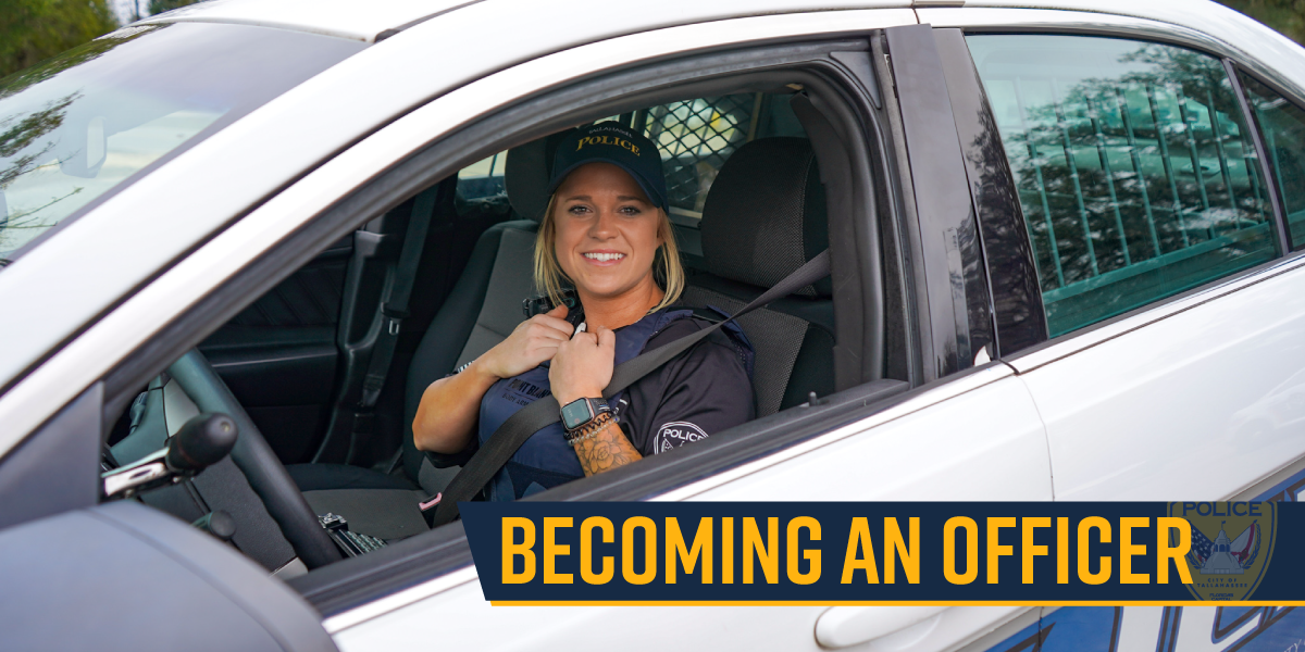 an officer sitting in her TPD cruiser